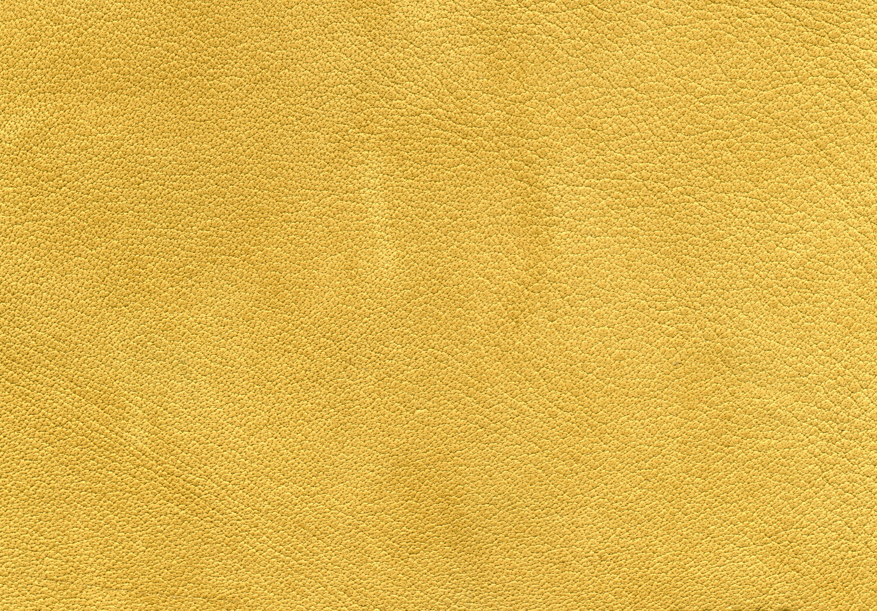 Темно желтый цвет. Желтый велюр. Горчичный фон однотонный. Желтая кожа. Ткань горчичная текстура.